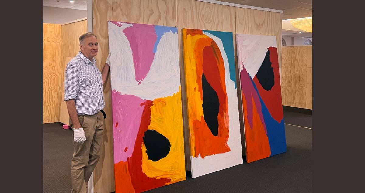 BAMM interim director Bruce Tindale with a painting by Sally Gabori featured in the pop-up exhibition in the Max Centre. The gallery is scheduled to re-open in June. Photo Sarah Vickerman