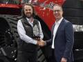 Kenway and Clark chef executive Pete McCann receives the Case IH parts and service Dealer of the Year award from CNH head of parts and service ANZ Heath Joiner. Picture supplied