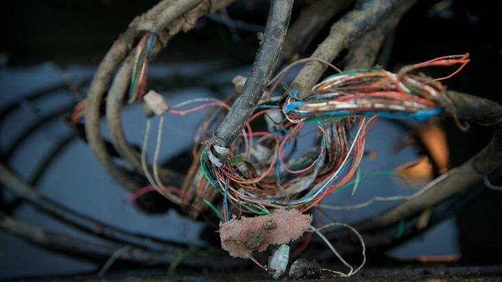 Telephone lines near Ryde Joinery in Punchbowl, which have been out of order since April. .
 Photo: Wolter Peeters
