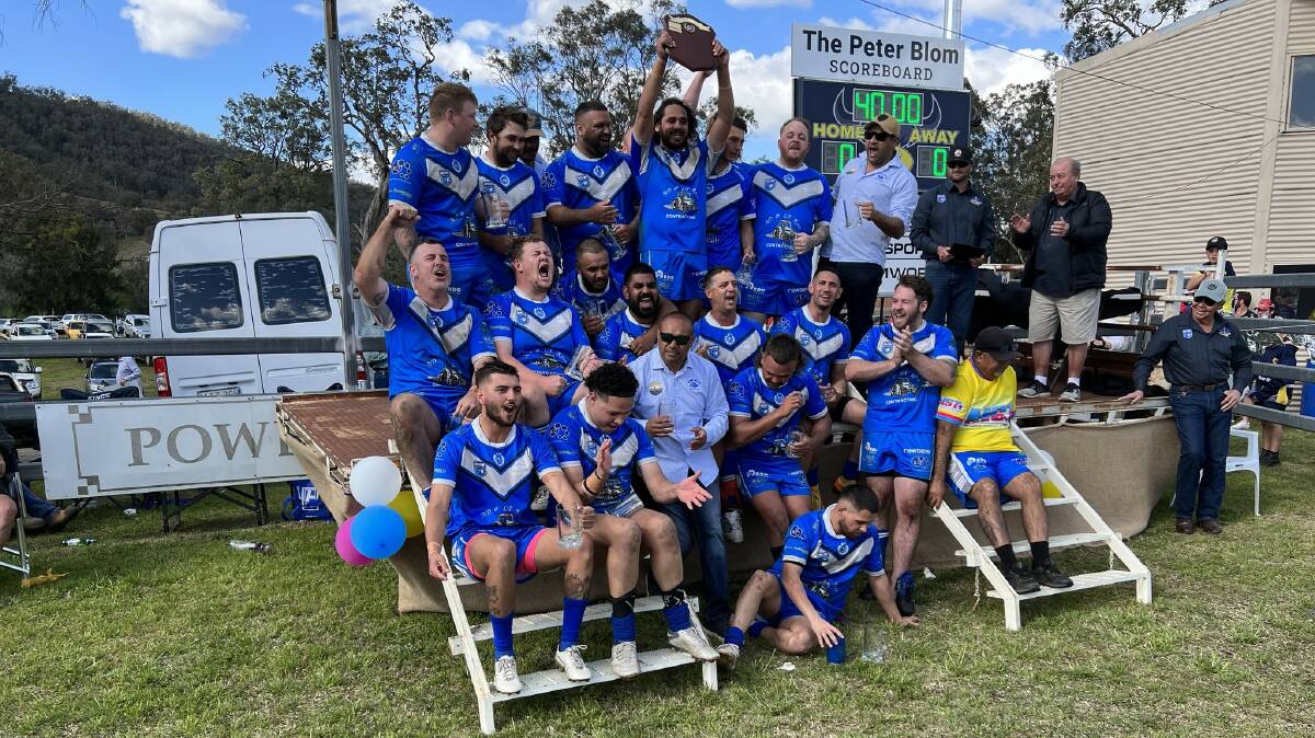 The Moree Boars lift the Group 4 reserve grade trophy. Picture by Group 4 media. +